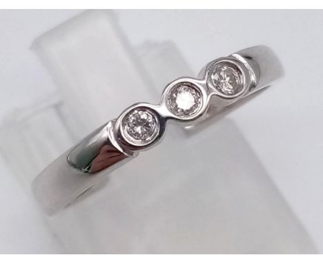 A 14K White Gold Three-Stone Diamond Ring. Size M.1.57g 