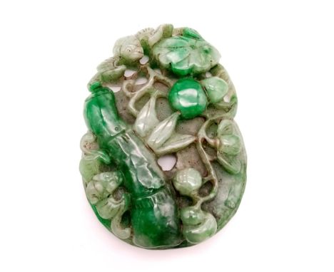 A Chinese Hand-Carved Large Jade Pendant. Floral decoration. 8.8 x 6.2cm. 