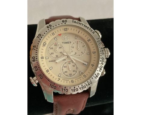 Timex TACHYMETER chronograph, Expedition model with alarm,stopwatch,and water resistant features. Quality brown strap. Full w