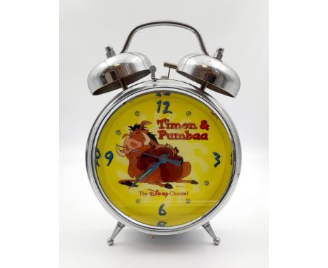 A Disney Timon and Pumbaa Double Bell Alarm Clock. 17 x 21cm. In working order but no guarantees.