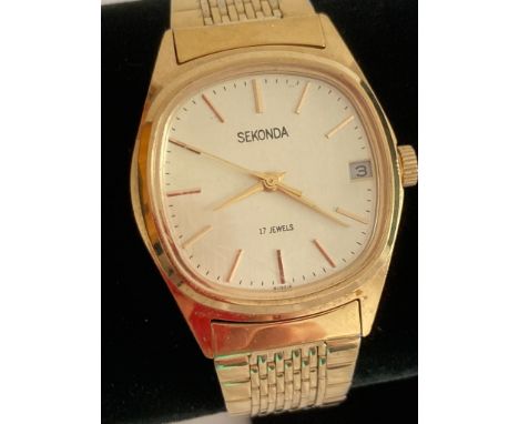 Vintage Gentlemans SEKONDA wristwatch in gold tone.Original Russian production model, having sweeping second hand and date wi