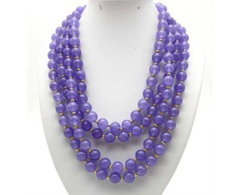 A Four-Row Lavender Jade Beaded Necklace. Gilded clasp. 44cm. 