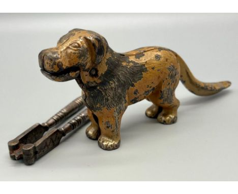 Two Vintage Iron Nutcrackers. A dog and a set of old school paddle crushers! Dog -23cm. A/F 