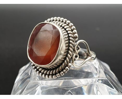 A 15cts Hessonite Garnet Gemstone Ring in Vintage Antique style sterling silver. Ring size Q 