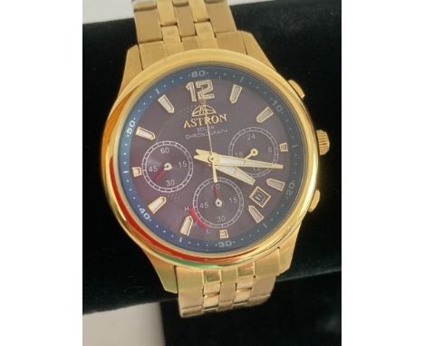 ASTRON SOLAR CHRONOGRAPH in gold tone.Blue face model in full working order,said to be the most accurate watch in the world. 