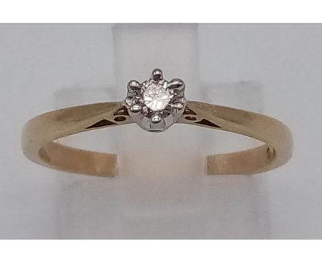 A 9K White and Yellow Gold Diamond Solitaire Ring. Diamond places in a Crown setting. Size N/M. Total weight: 1.83g 