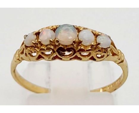 A 9K Yellow Gold Five Opal Stone-Set Ring. Size N. 1.39g total weight. 