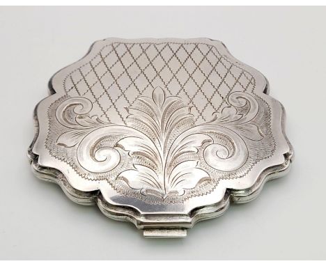 A Vintage Solid Silver Ladies Compact Clam. Clasp slightly tight but still works well. 800 hallmark. 9.5 x 9.5cm. 165.3g tota