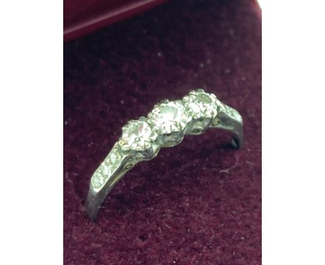 Vintage 18 carat WHITE GOLD and DIAMOND ring, having three quality diamonds set in PLATINUM and mounted to top with a further