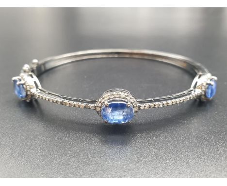 925 Silver bangle set with 3 Oval cut Kyanites & 92 Rose cut diamonds of approx 3ctsW.G.I (World Gemmological Institute) UK C