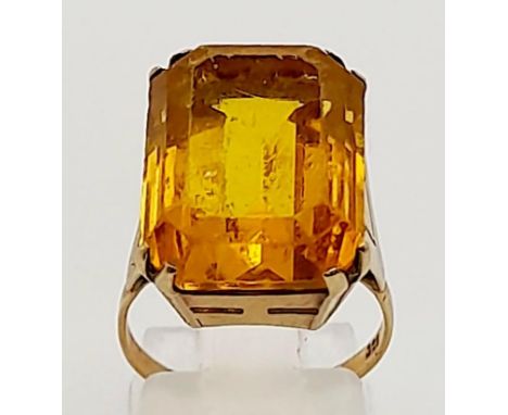 A Vintage 9K Yellow Gold Citrine Ring. Large rectangular citrine centre stone. Size L. 7.17g total weight. 