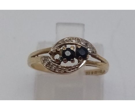 A 9K Yellow Gold Sapphire and Diamond Ring. One sapphire missing. A/F. Size K. 1.35g. 