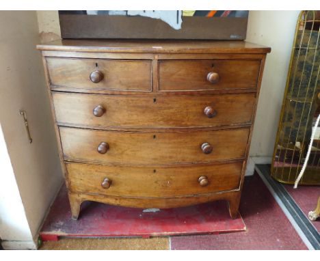A Victorian mahogany chest of two short over three long drawers and raised on carved bracket feet. H-103cm, W-102cm, D-47cm 