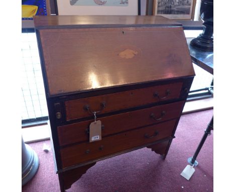 An Edwardian marquetry inlaid bureau with hinged flap above three drawers, raised on carved bracket feet. H-92cm, W-75cm, D-4
