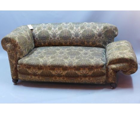 A Victorian mahogany framed Chesterfield drop end sofa upholstered in a William Morris style fabric 