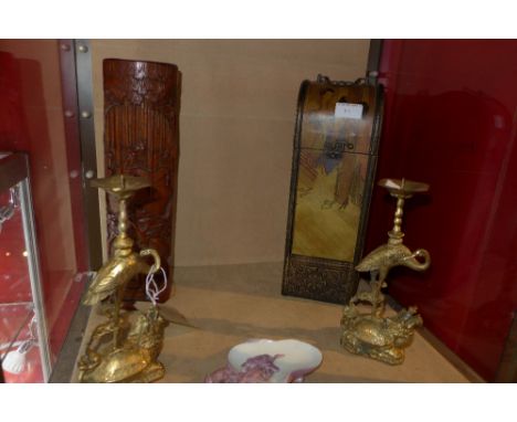 A collection of Chinese items to include a pair of gilt metal candle stick holders, a bamboo brush pot, brush rest and a wine