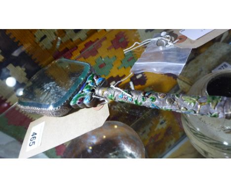 A Chinese white metal and enamel hand mirror. 
