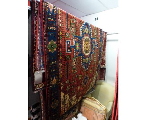 An extremely fine north west Persian Nahawand rug, 195 x 135cm central pole medallion with repeating floral motifs on a rouge