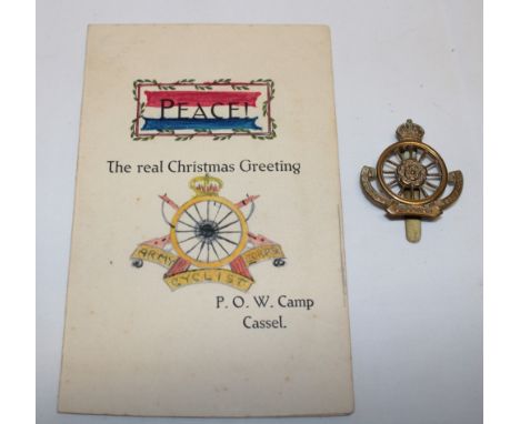 An unusual brass Hampshire Cyclist Battalion cap badge and an Army Cyclist Corps  peace Christmas card - POW Camp Cassel (2)