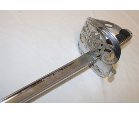 An EIIR Officer's sword of the Scots Guards by Wilkinson of London No. 76903, the blade etched with 27 battle honours and emb