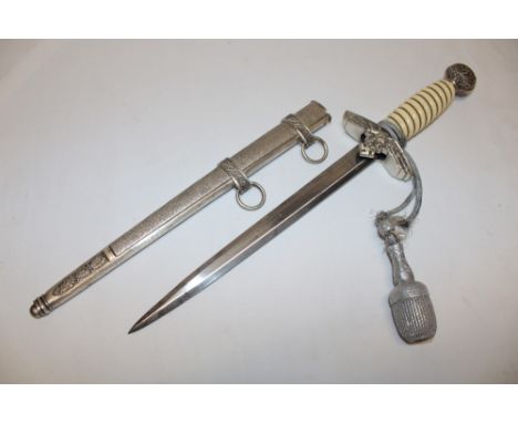 A Second War German Luftwaffe dagger 2nd pattern with 10" double edged steel blade by Paul Weyersberg &amp; Co Berlin, tradit