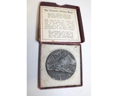 An iron 1915 Sinking of the Lusitania medal in original box