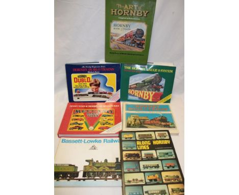 Various toy train and car books including Bassett-Lowke Railways, Hornby Dublo Trains, The Hornby Gauge O system, Dinky Toys 