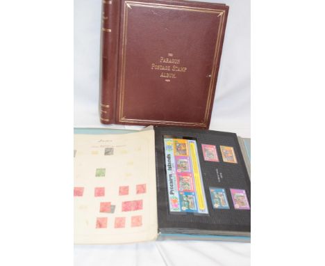 A folder album containing a selection of Pitcairn Islands stamps including numerous mint examples and mini sheets, a small al