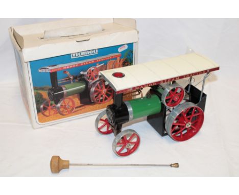 A Mamod steam tractor in original box with accessories