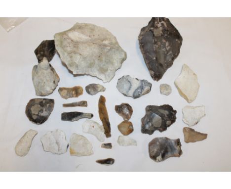 An ancient flint axe head, various flint arrow heads, flint scrapers and flakes etc., believed excavated in the Gloucester ar