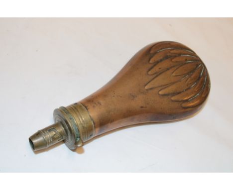 A 19th century Battie patent brass mounted copper powder flask with raised leaf decoration