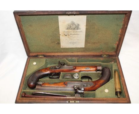 A pair of cased Cavalry Officer's 13-bore percussion belt pistols by Westley Richards of New Bond Street, London with 5½" oct