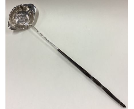 A large 19th Century French silver toddy ladle. Marked 950 Standard. Approx. 49 grams. Est. £60 - £80.