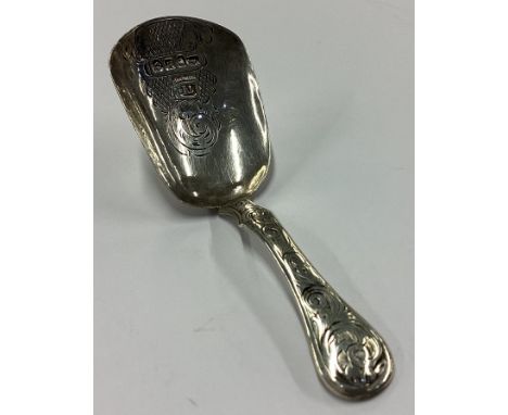 A Victorian silver caddy spoon with bright-cut decoration. Birmingham 1856. By Thomas Davenport. Approx. 5 grams. Est. £30 - 
