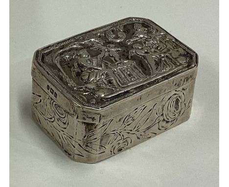 A Continental silver snuff box with chased scene to cover bearing English import marks. Approx. 67 grams. Est. £60 - £80.