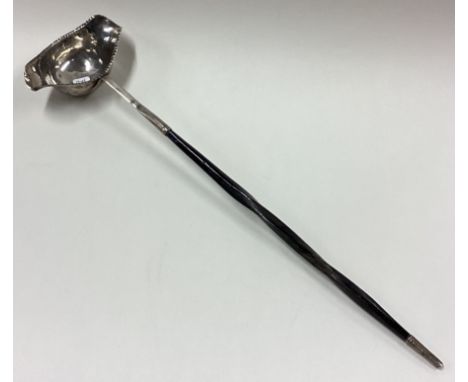 A large 19th Century silver toddy ladle. Approx. 51 grams. Est. £50 - £80.