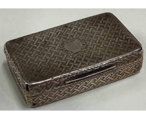 A William IV silver snuff box with engine turned decoration. London 1832 Approx. 50 grams. Est. £60 - £80.