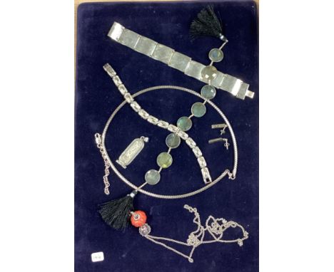 A heavy silver panelled bangle together with other silver jewellery. Approx. 75 grams. Est. £30 - £50.
