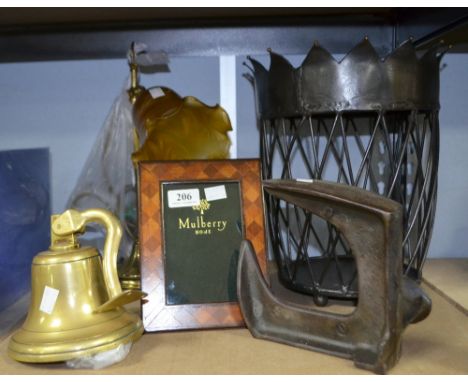 Christopher Wray desk lamp, iron waste bin with coronet top, wall mounted bell, shoe last and Mulberry photo frame.