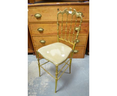 Brass framed single chair, gilt and marble based standard lamp, white porcelain vase and a gilt and marble table lamp