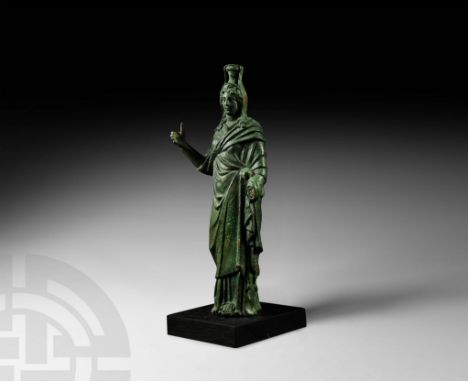 2nd-3rd century AD. A bronze statuette of Ceres (Greek Demeter), the goddess of agriculture and fertility, depicted standing 