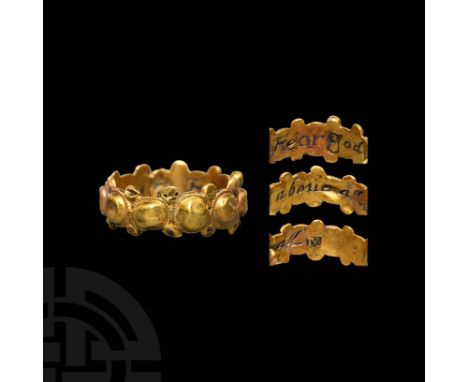 Mid 16th-early 18th century AD. A gold band ornamented with a circumferential frieze of oval bosses to the external face, fau