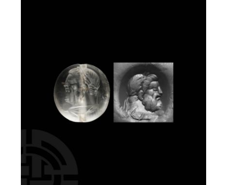 c.1st millennium BC. A scaraboid rock crystal stamp seal bearing intaglio male bust facing left, full beard and laureate crow