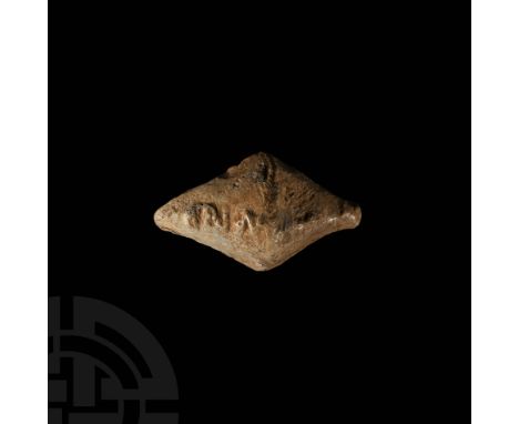 1st century BC. A facetted biconical lead slingshot (glans) with inscription in Latin letters 'CN' (Cneius) 'MAG' (Magnus) on
