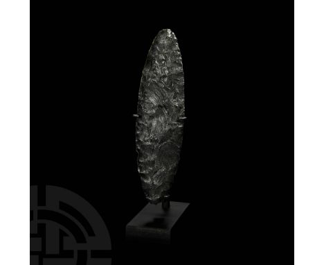 c.8th-10th century AD. A leaf-shaped ceremonial bifacial obsidian spearhead; accompanied by a custom-made display stand. For 