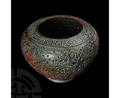 13th-14th century AD. A substantial bronze piriform incense bowl or lamp with stepped shoulder and shallow rim, floriated Kuf