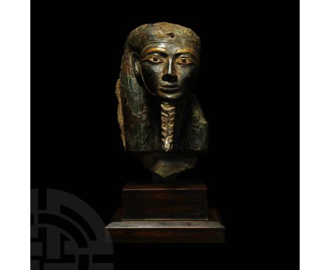 21st-22nd Dynasty, 1000-900 BC. A hollow cast bronze head of a pharaoh wearing a tripartite wig and a long braided chin-beard