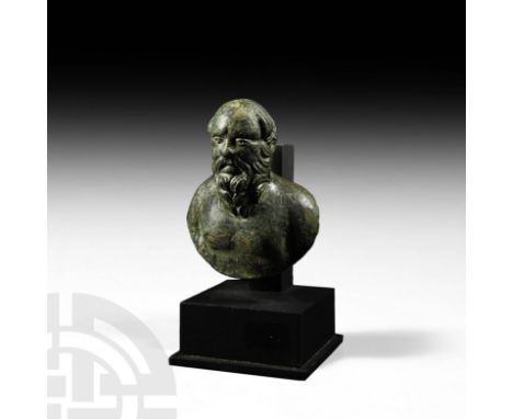 1st-2nd century AD. A bronze hollow bust of the philosopher Socrates, with fastening nail on the back and rectangular recess 