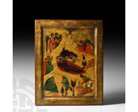 20th century AD. A rectangular wooden icon with recessed panel to the face, gilded surface with painted scene of the Nativity