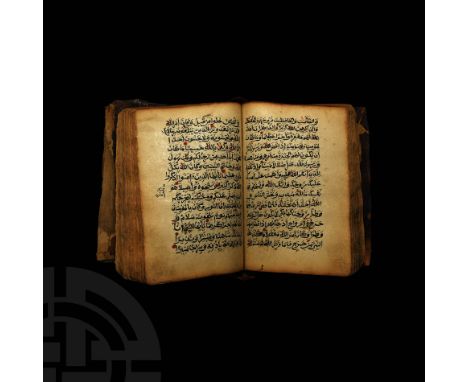 Harar, East Africa, 19th century AD. A leather-bound manuscript with cloth spine, laid paper pages, rectangular blocks of nas